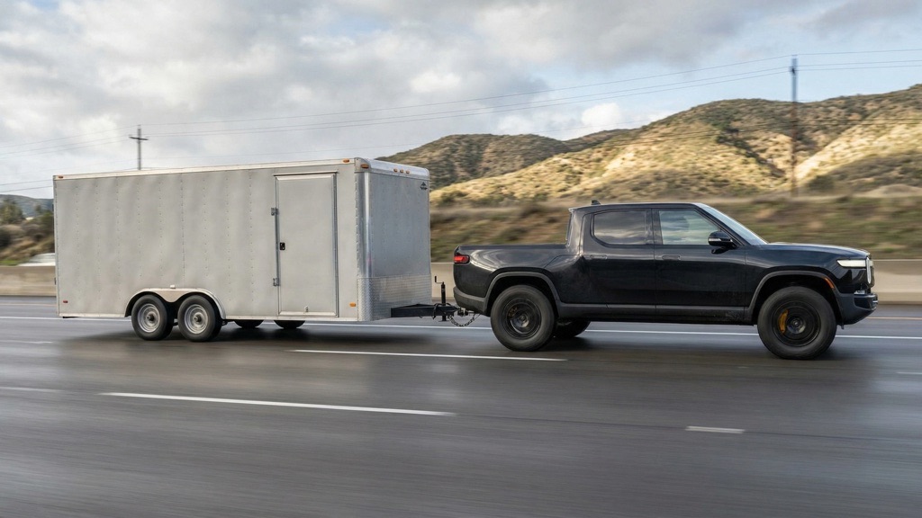 Electric pickup towing heavy trailer