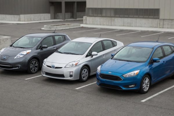 Used electric, hybrid, and gasoline cars side by side representing ownership choices in 2026