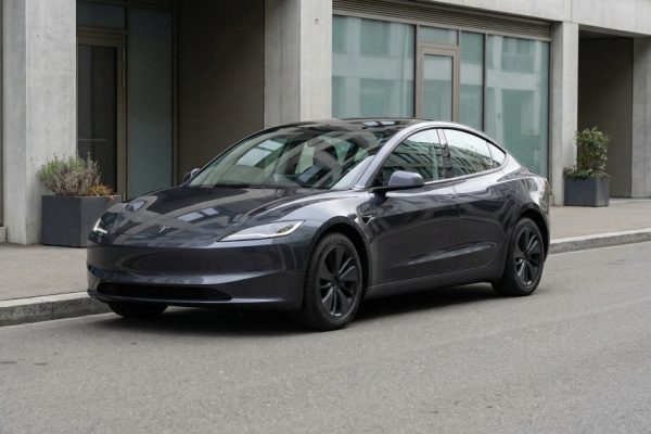 Tesla Model 3 Highland refresh photographed in real-world urban conditions, 2026 review