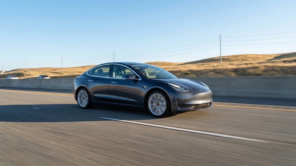 Best Electric Cars Under $25,000 (2026): The Smart Buyer’s Guide With Real Numbers 2 Tesla Model 3 Real-World Highway Driving